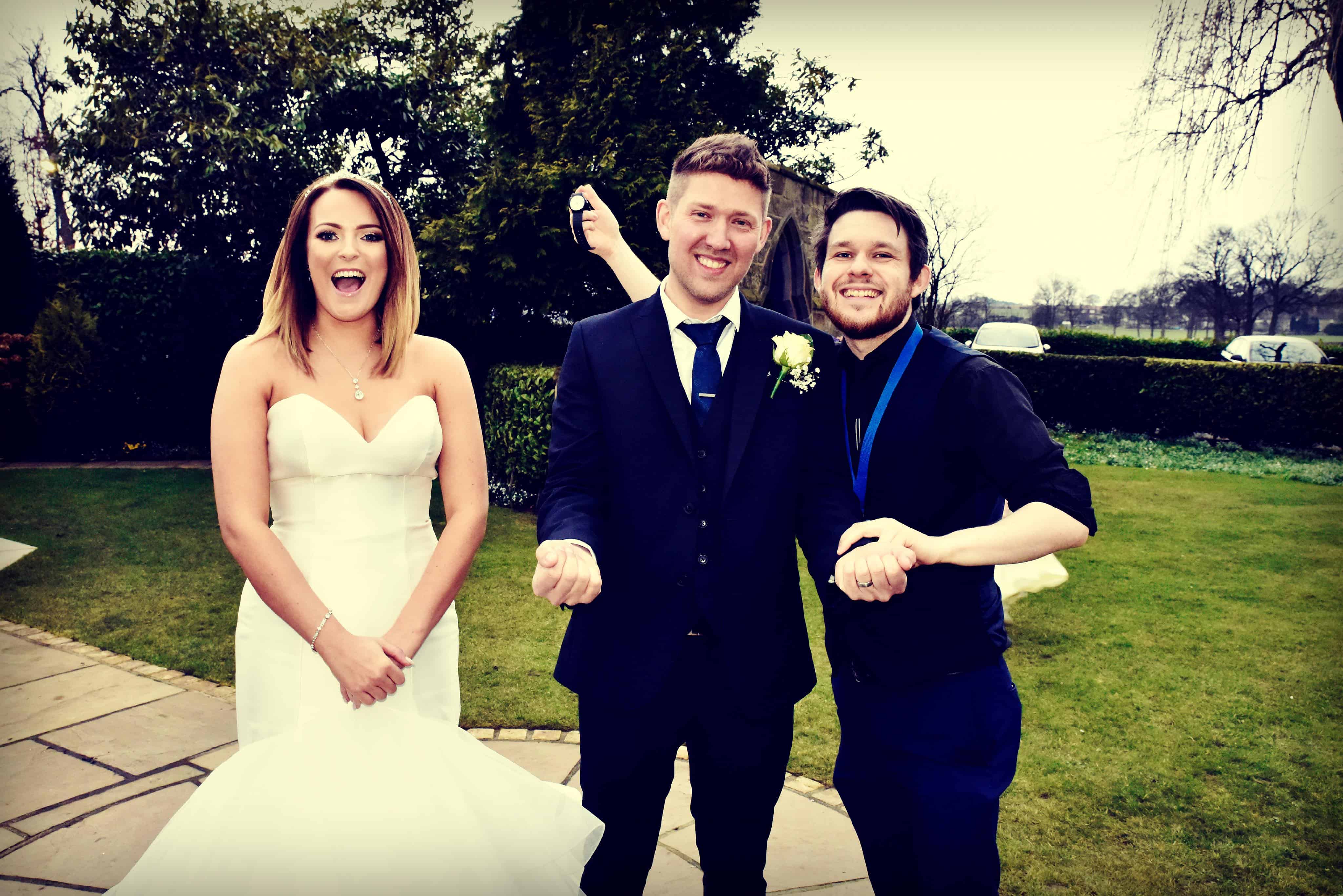 Professional Magician Greg Holroyd performing a small stand-up show for the Bride and Groom on their wedding day